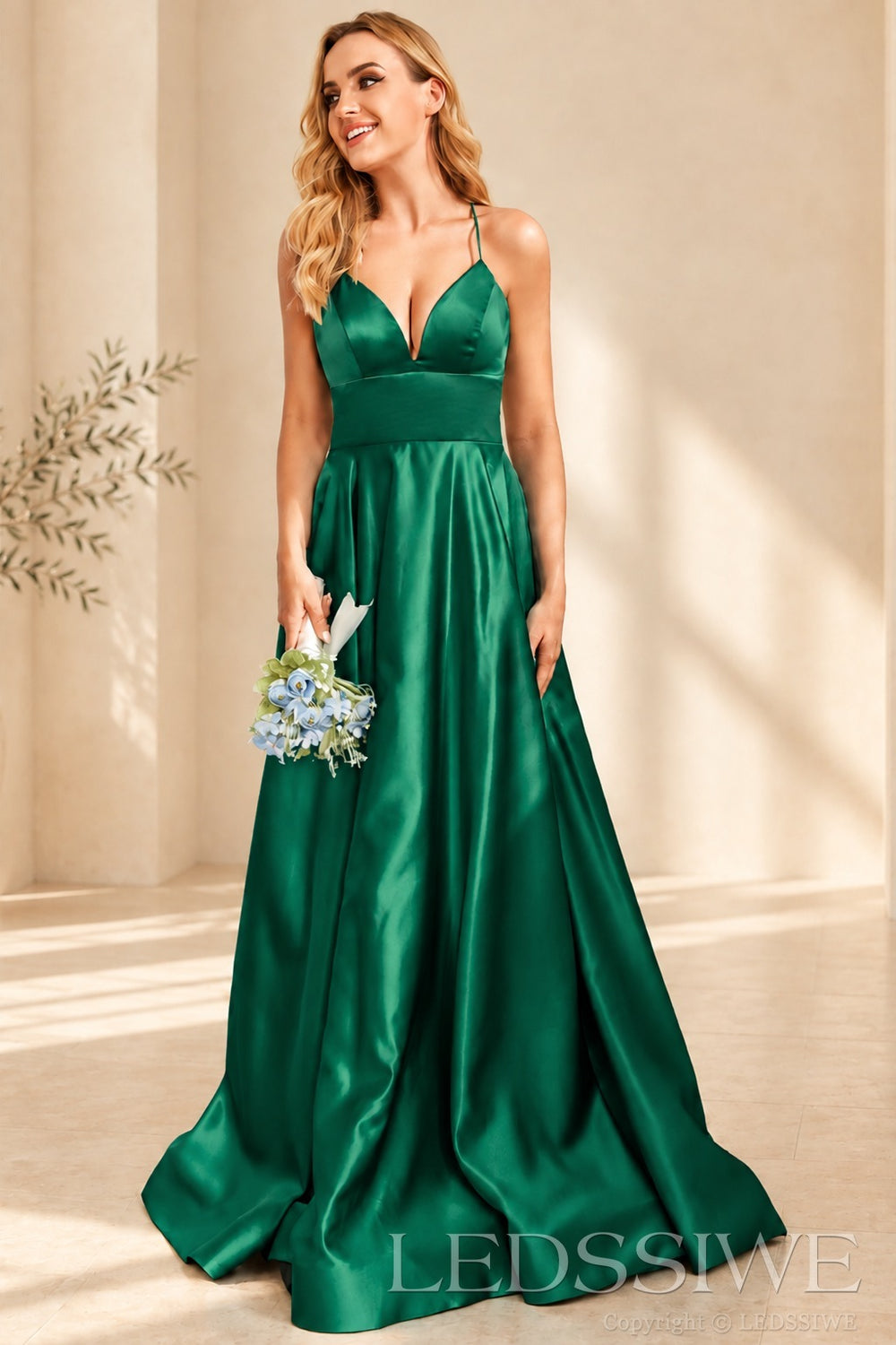 Emerald spaghetti strap satin a-line prom dress with lace-up back