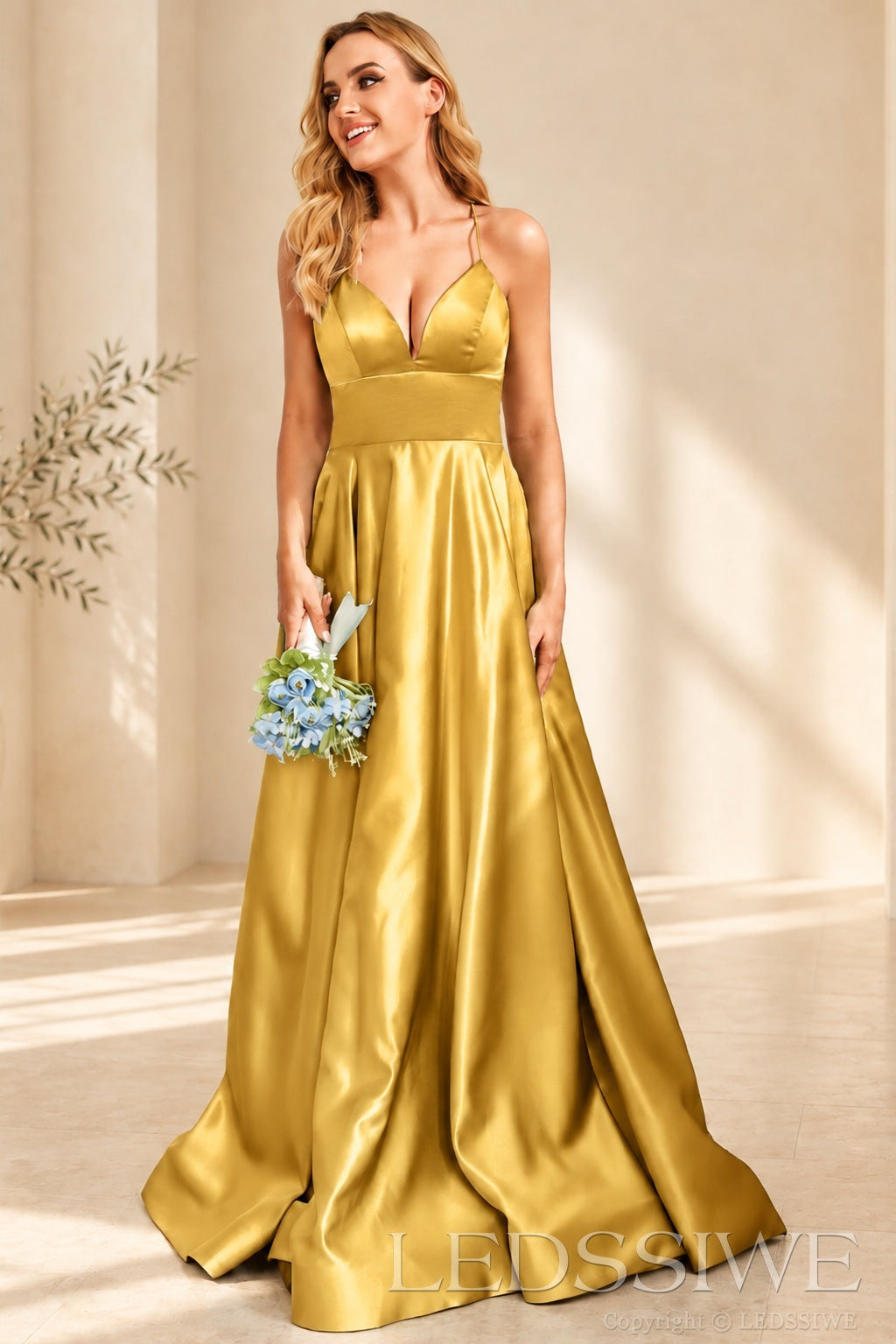 Gold spaghetti strap satin a-line prom dress with lace-up back