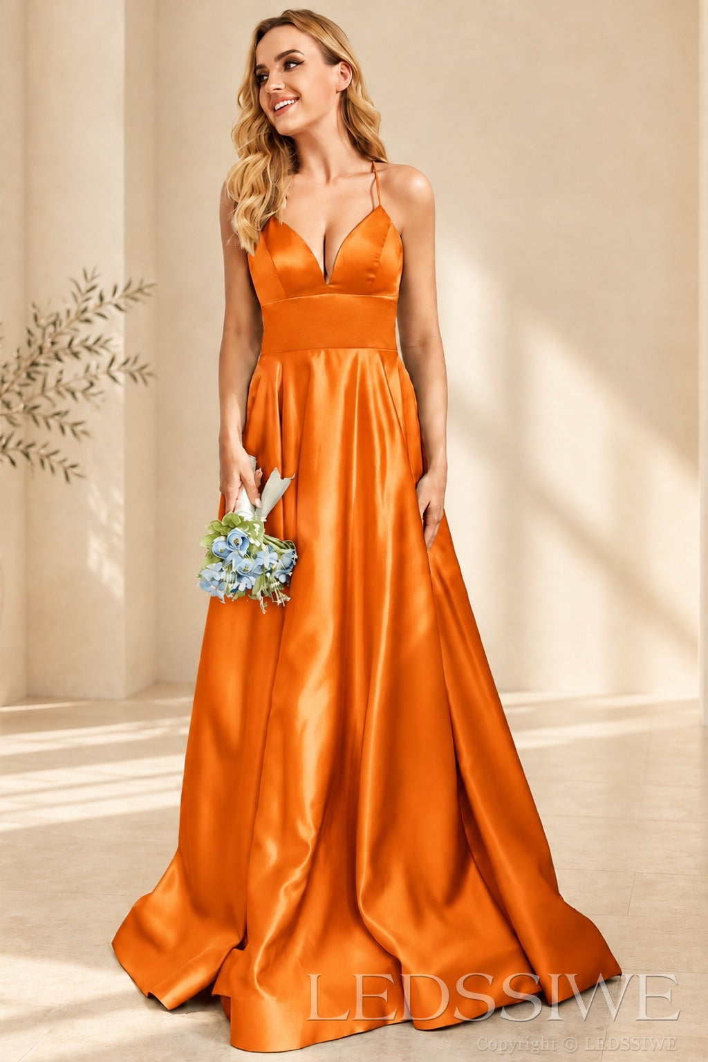Orange spaghetti strap satin a-line prom dress with lace-up back