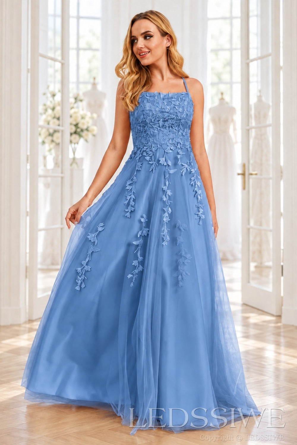 Blue tulle a-line prom dress with lace appliqués and lace-up back