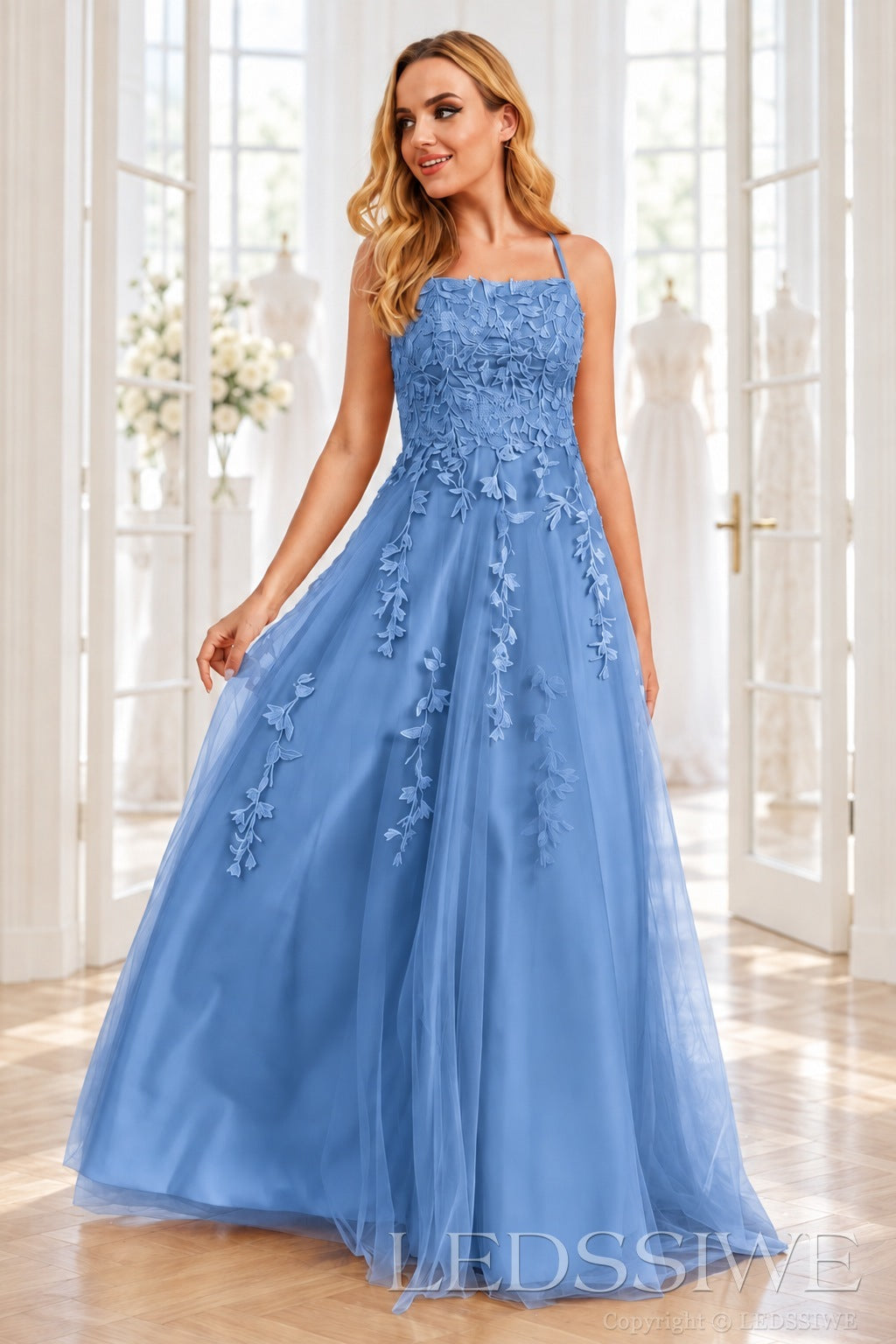 Blue tulle a-line prom dress with lace appliqués and lace-up back