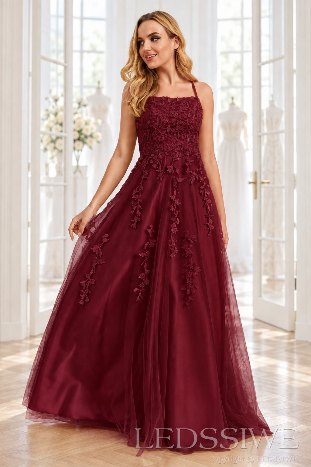 Burgundy tulle a-line prom dress with lace appliqués and lace-up back
