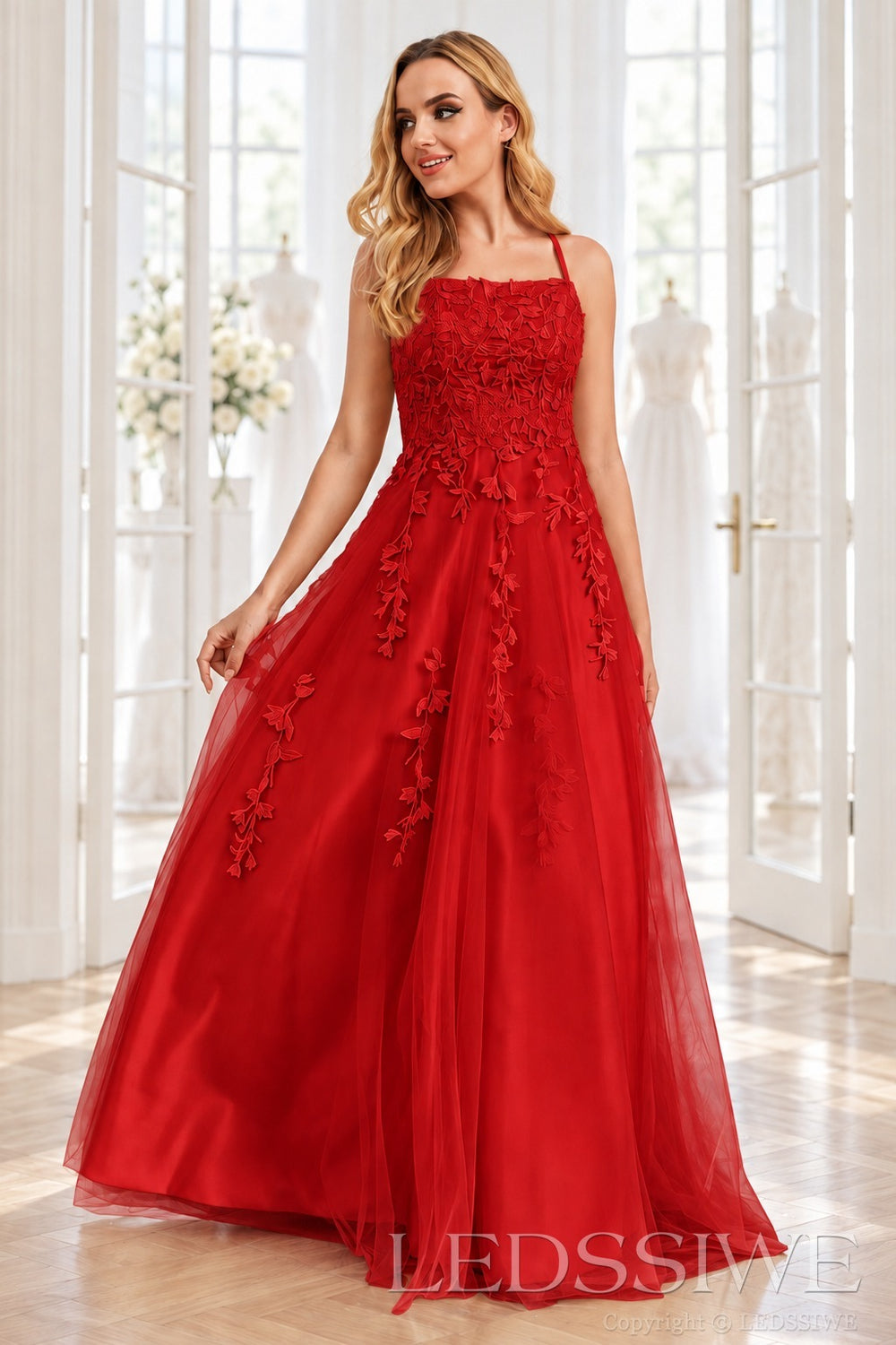 Red tulle a-line prom dress with lace appliqués and lace-up back