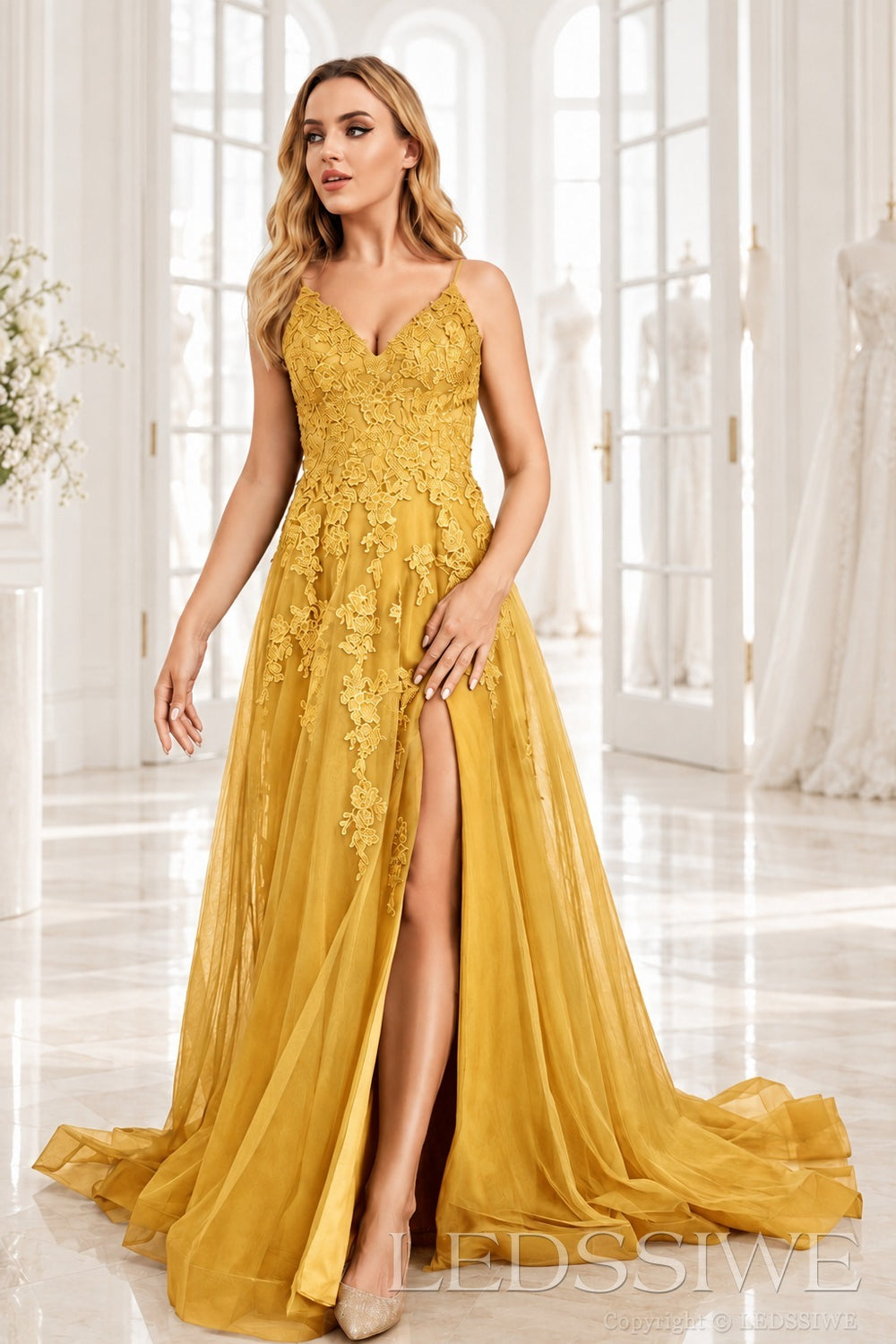 Gold v-neck tulle a-line prom dress with lace appliqués, slit and sweep train