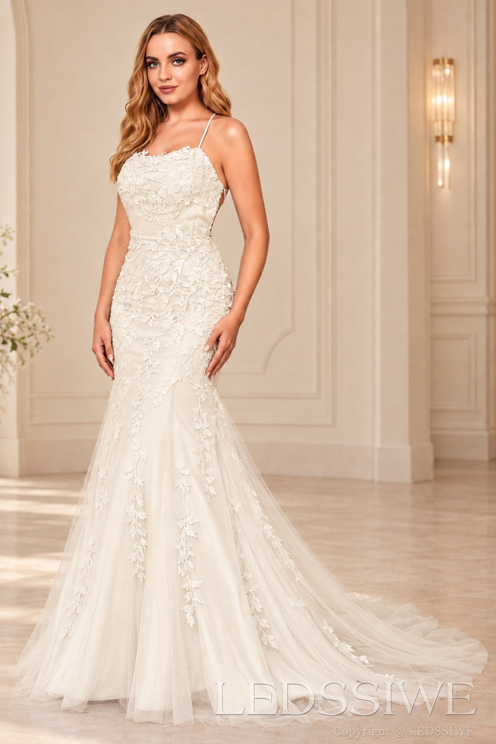 Ivory mermaid tulle prom dress with lace appliqués and lace-up open back