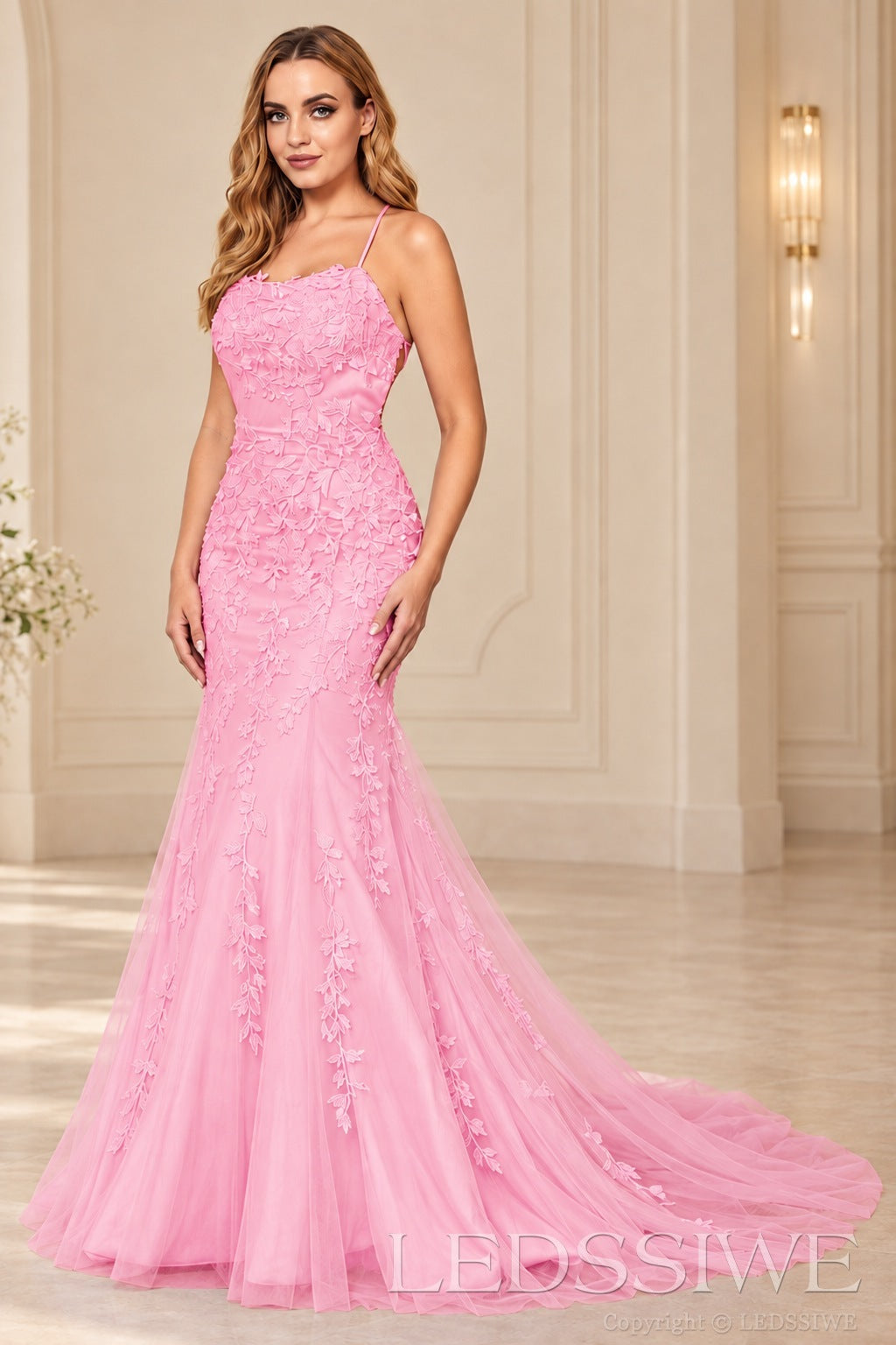 Pink mermaid tulle prom dress with lace appliqués and lace-up open back