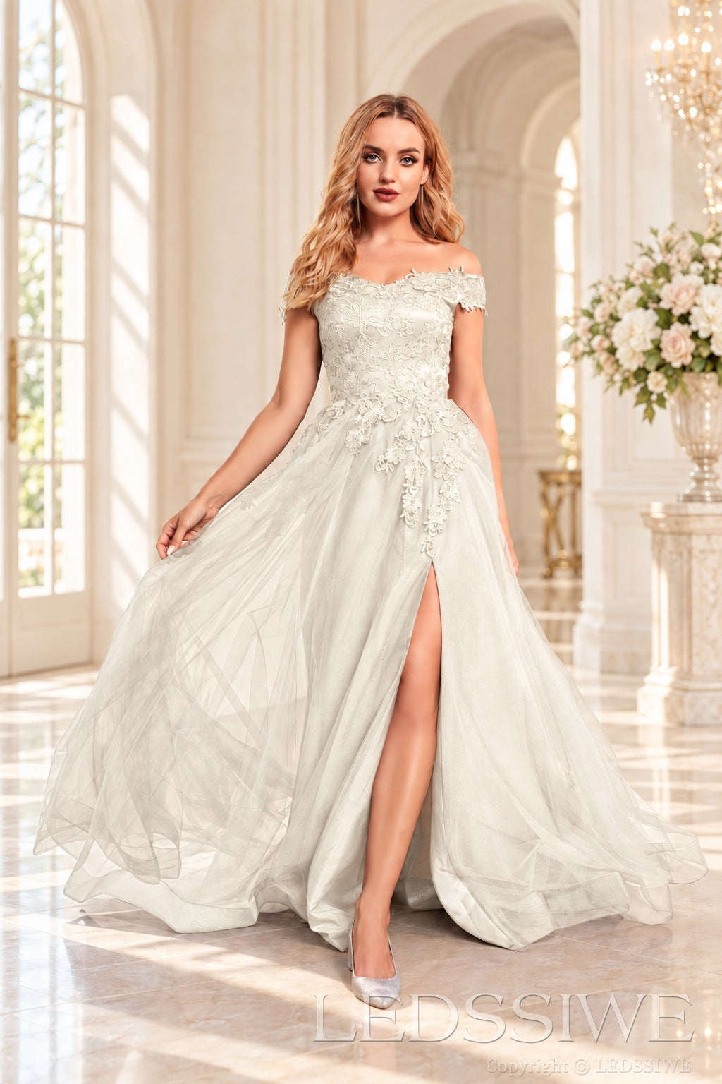 Ivory off the shoulder lace tulle ball gown with slit and lace up back