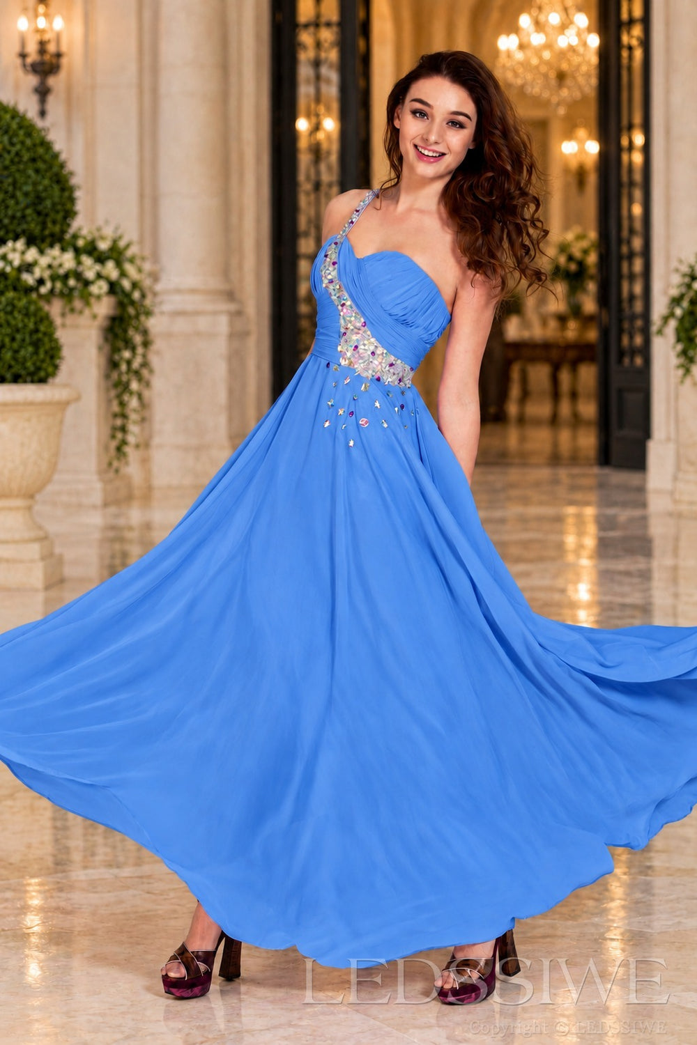 blue chiffon a-line prom dress with beaded sweetheart bodice and spaghetti strap