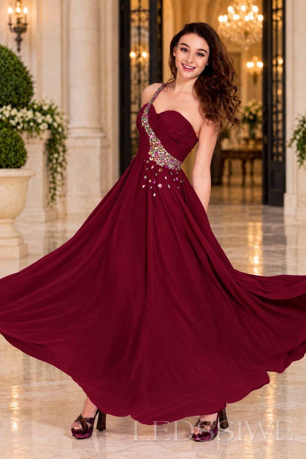 burgundy chiffon a-line prom dress with beaded sweetheart bodice and spaghetti strap