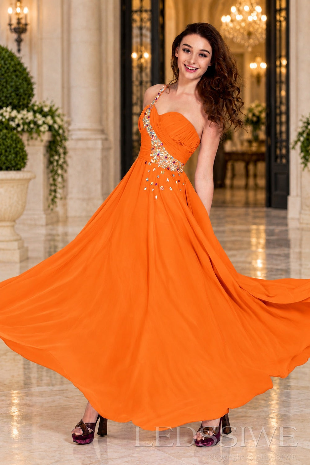orange chiffon a-line prom dress with beaded sweetheart bodice and spaghetti strap