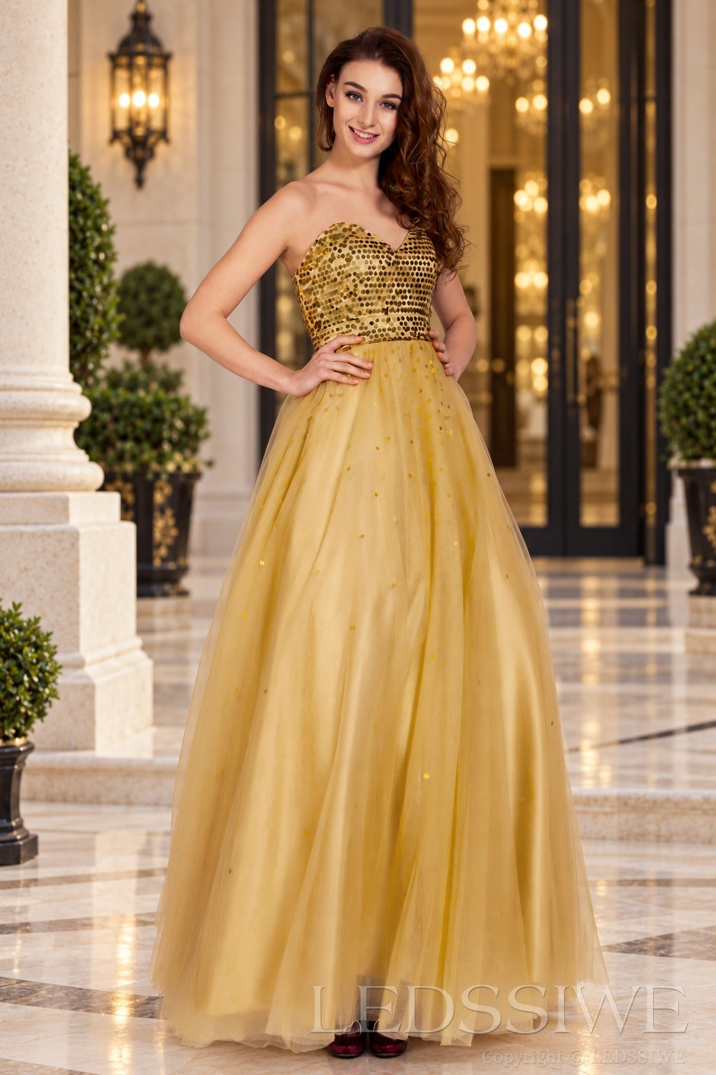 gold strapless sequin sweetheart a-line prom dress with tulle skirt front view