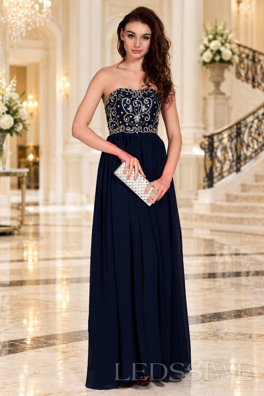 navy blue strapless chiffon sweetheart a-line prom dress with beaded corset bodice side view