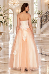 peach strapless lace tulle ball gown prom dress with corset bodice and tie back back view