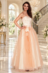 peach strapless lace tulle ball gown prom dress with corset bodice and tie back front view