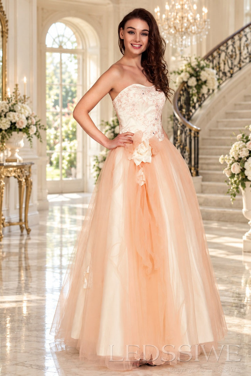 peach strapless lace tulle ball gown prom dress with corset bodice and tie back front view