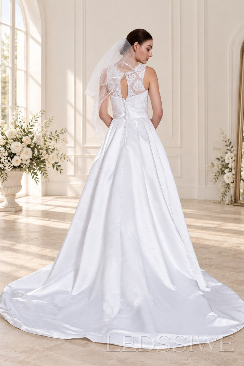 ivory halter beaded satin a-line wedding dress with lace veil cape back view