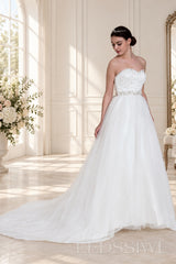 ivory spaghetti strap beaded tulle a-line wedding dress with jeweled belt three-quarter view