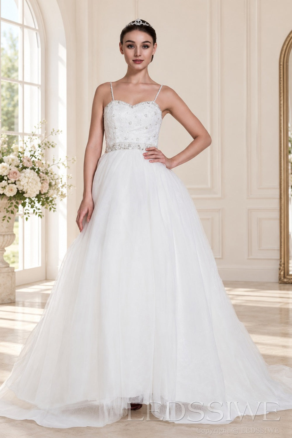ivory spaghetti strap beaded tulle a-line wedding dress with jeweled belt front view