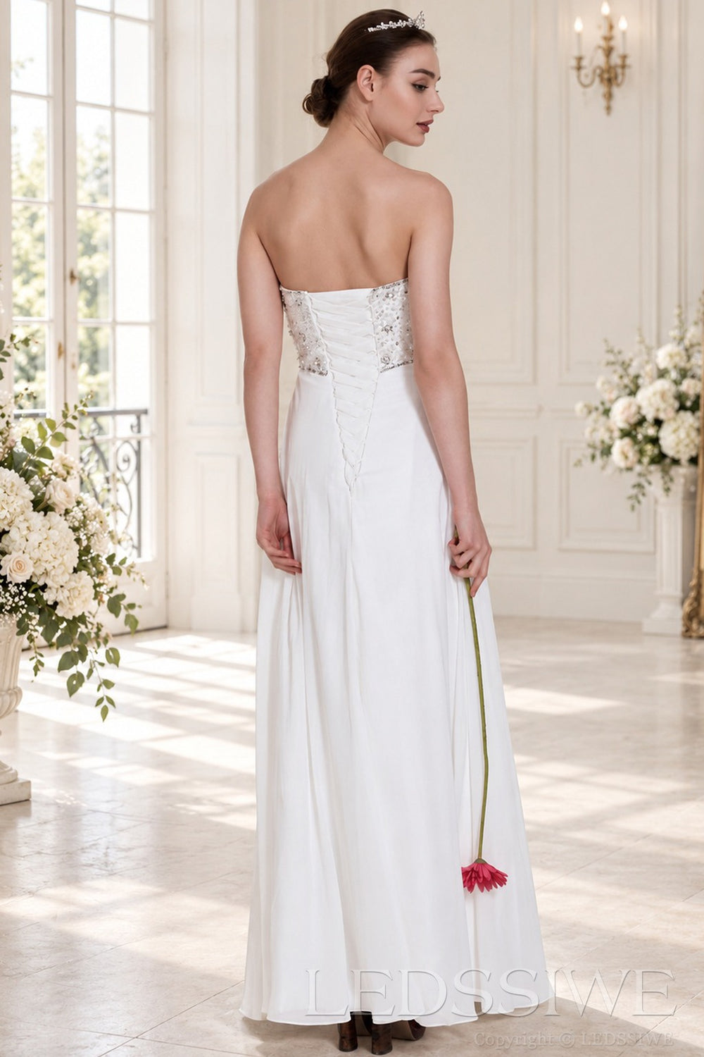 ivory strapless beaded chiffon a-line wedding dress with corset back back view