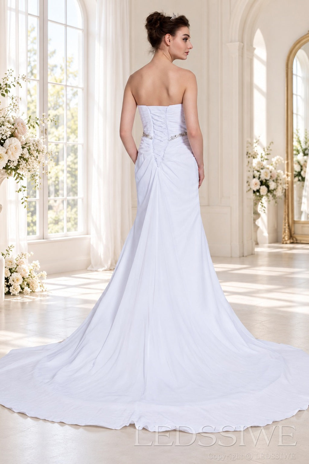 white strapless ruched chiffon mermaid wedding dress with crystal waist belt back view