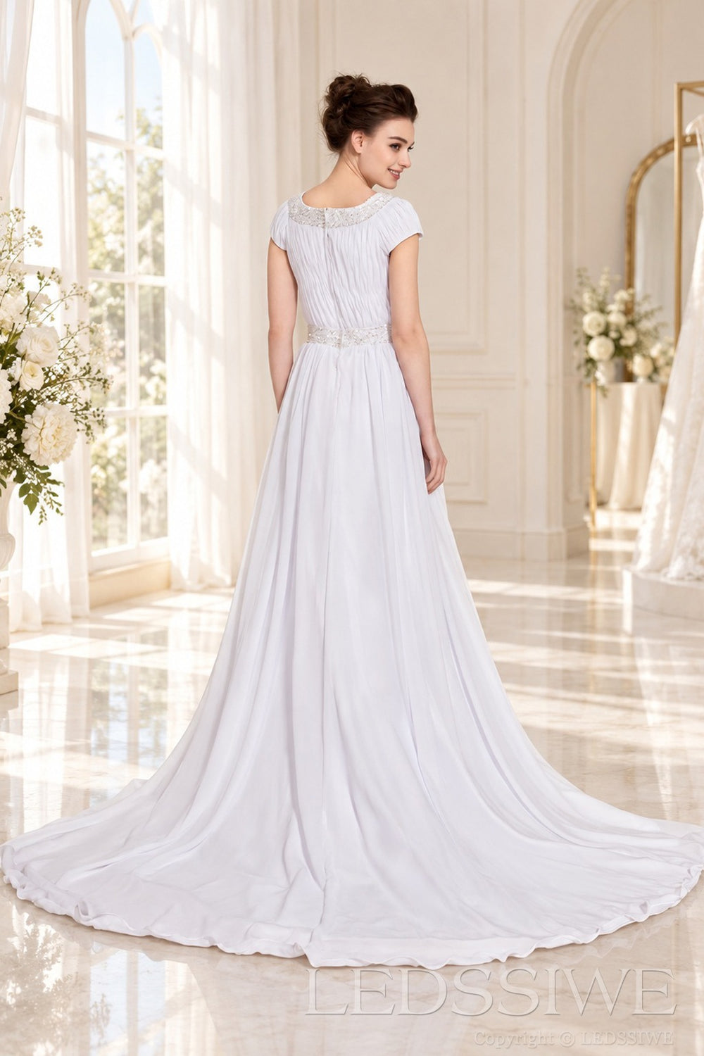 ivory illusion boat neck cap sleeve pleated chiffon a-line wedding dress back view